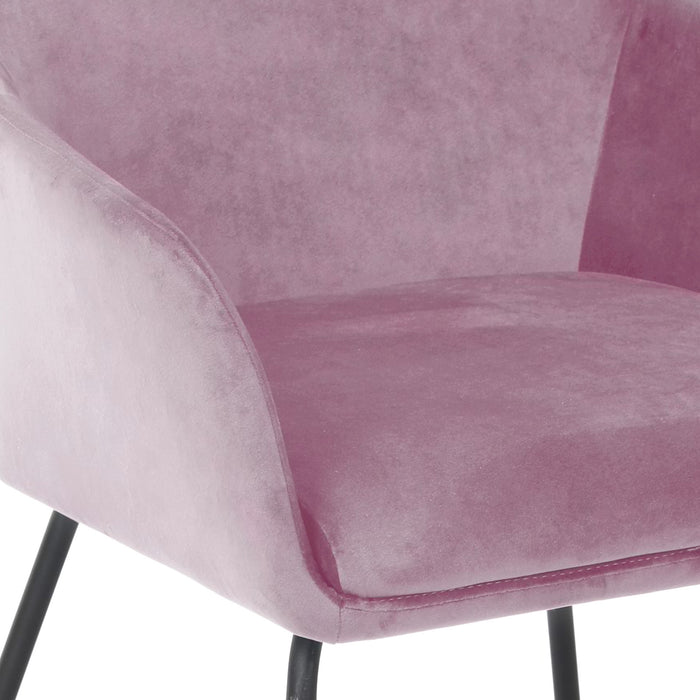 Detailansicht Sitzpolster rosa Stoff-Esszimmerstuhl mit gepolsterten Armlehnen und schwarzem Metallgestell
