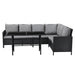 Ecklounge aus schwarzem Polyrattan mit grauen Polstern und schwarzem rechteckigem Tisch