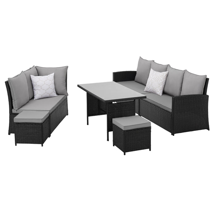Gartenmöbel-Set angeordnet als ein Zweier- und ein Dreiersofa mit Tisch und Hocker.