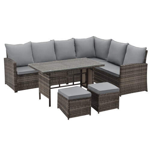 Braunes Gartenmöbel-Set aus Polyrattan mit Ecksofa, Tisch mit Glasplatte und zwei Hockern, ideal für Terrasse oder Balkon.