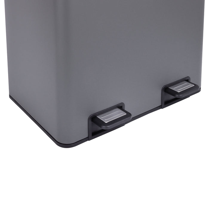 Unterer Bereich eines grauen Mülleimers mit zwei rechteckigen Fußpedalen und schwarzem Sockel.