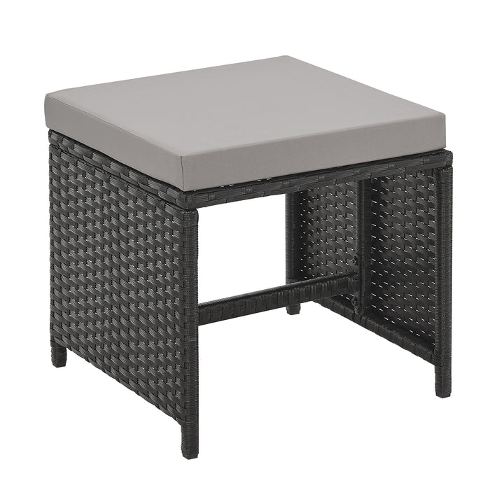schwarzer Hocker aus Polyrattan mit grauem Sitzpolster