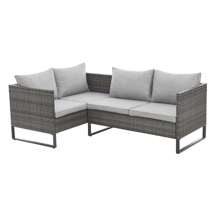 Graue Polyrattan Gartenlounge Stellmöglichkeit Ecksofa mit Kissenbox daneben