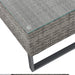 Detail Glasplatte mit Gummifüßen auf grauem Tisch  
