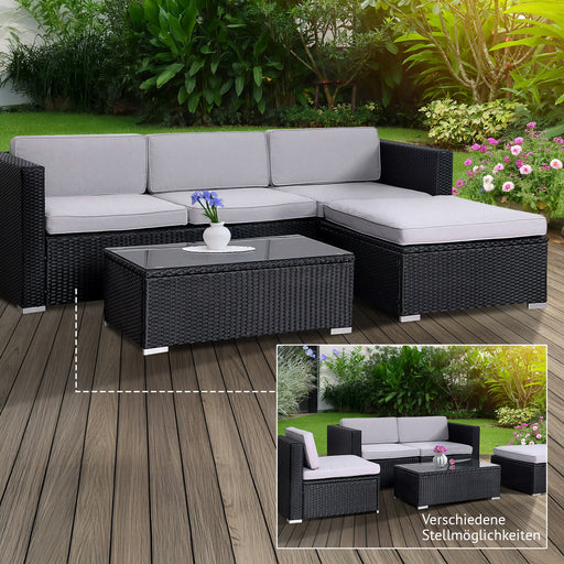 Schwarze Polyrattan Garten-Lounge mit grauen Polstern auf einer sonnigen Terrasse - verschiedene Stellmöglichkeiten