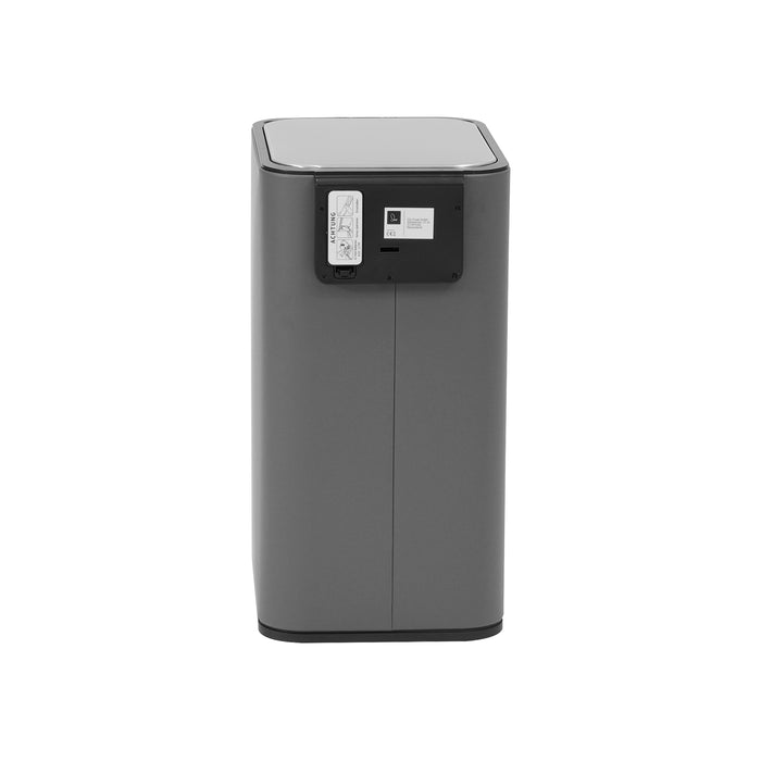 Rückansicht von grauem Metallmülleimer mit rechteckigem, schwarzen Paneel und Batteriefach