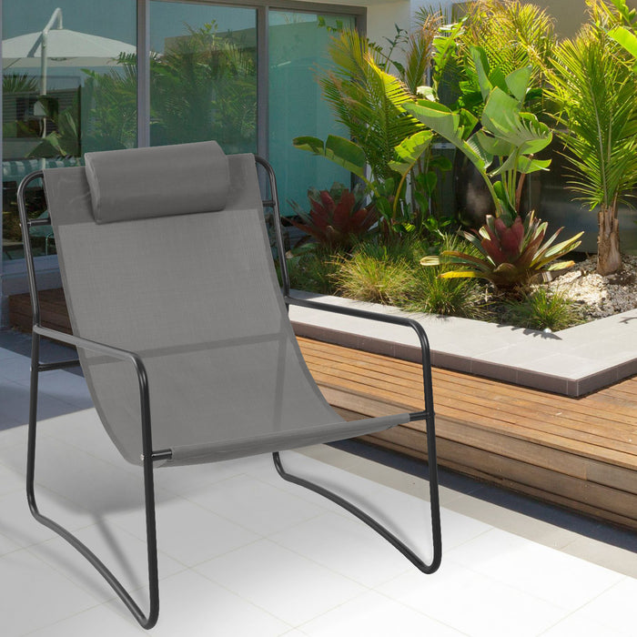 Outdoor Relaxsessel dunkelgrau mit Nackenkissen auf einer Terrasse