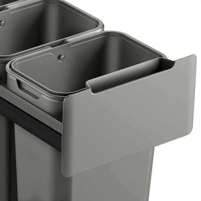 Graues Gestell aus Metall mit zwei herausnehmbaren, rechteckigen Mülleimern aus Kunststoff, Teil eines Einbaumülleimersystems