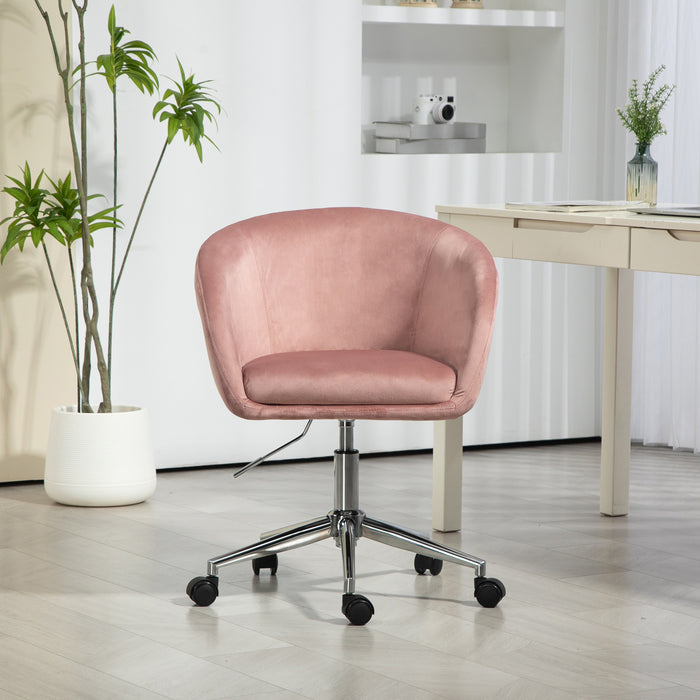 Frontalansicht Rosa Bürostuhl mit Rollen vor weißer Wand, neben einem Holzschreibtisch mit Pflanze im Hintergrund