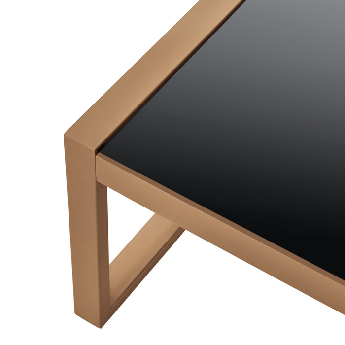 Eckbild Tisch mit schwarzer Glasplatte