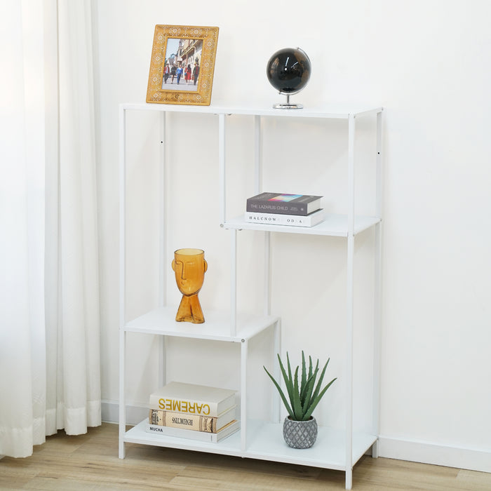 Weißes Metallregal mit vier Fächern, dekoriert mit einem Bilderrahmen, schwarzem Globus, oranger Vase, Büchern und einer grünen Pflanze in grauem Topf