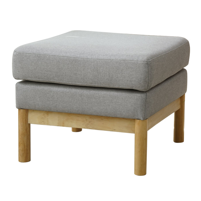 Grauer gepolsterter Hocker mit quadratischer Sitzfläche und hellen Holzbeinen