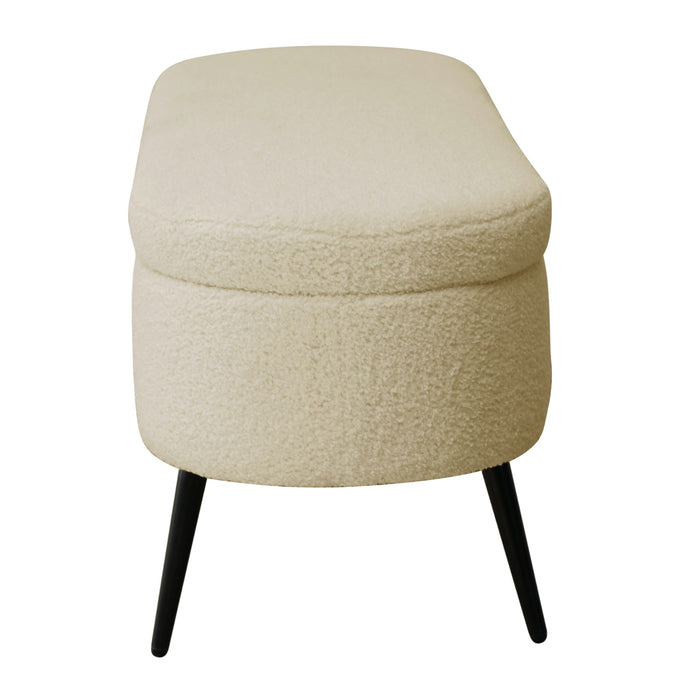 Beige Sitzbank mit weichem Polster und schwarzen, schrägen Beinen aus Metall und runden Seiten