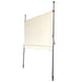 Beige Markise mit Metallgestell, eingeklappt, mit Wellenkante am unteren Rand